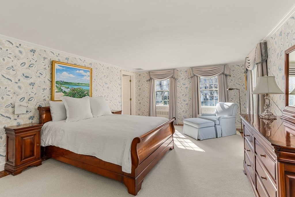 7 Nantucket Road Wellesley, MA 02481 - Photo 21 of 37 a spacious bedroom with a bed couch and a window
