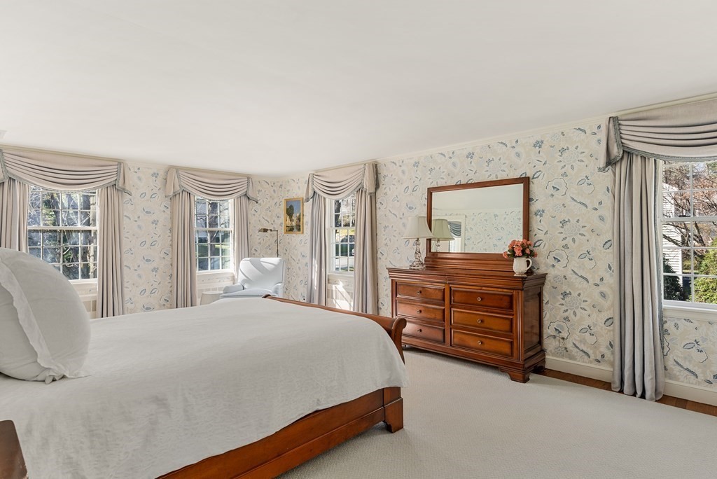 7 Nantucket Road Wellesley, MA 02481 - Photo 22 of 37 a bedroom with a bed and a dresser