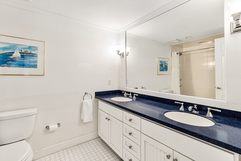 7 Nantucket Road Wellesley, MA 02481 - Photo 29 of 37 a bathroom with a granite countertop sink and a mirror