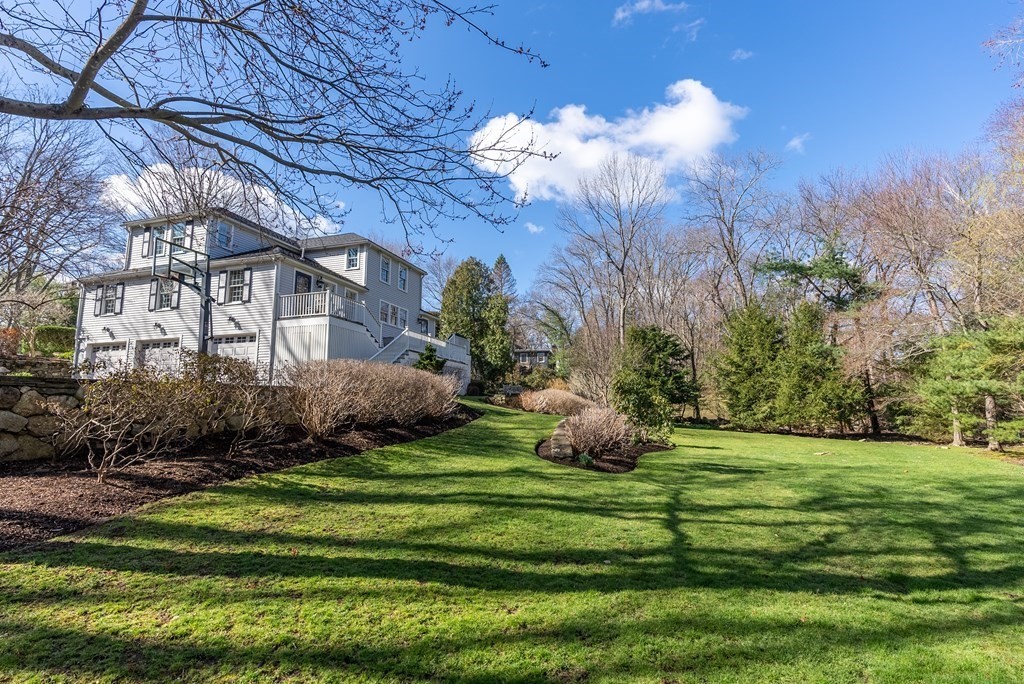 7 Nantucket Road Wellesley, MA 02481 - Photo 3 of 37 a view of a house with a yard and a large tree