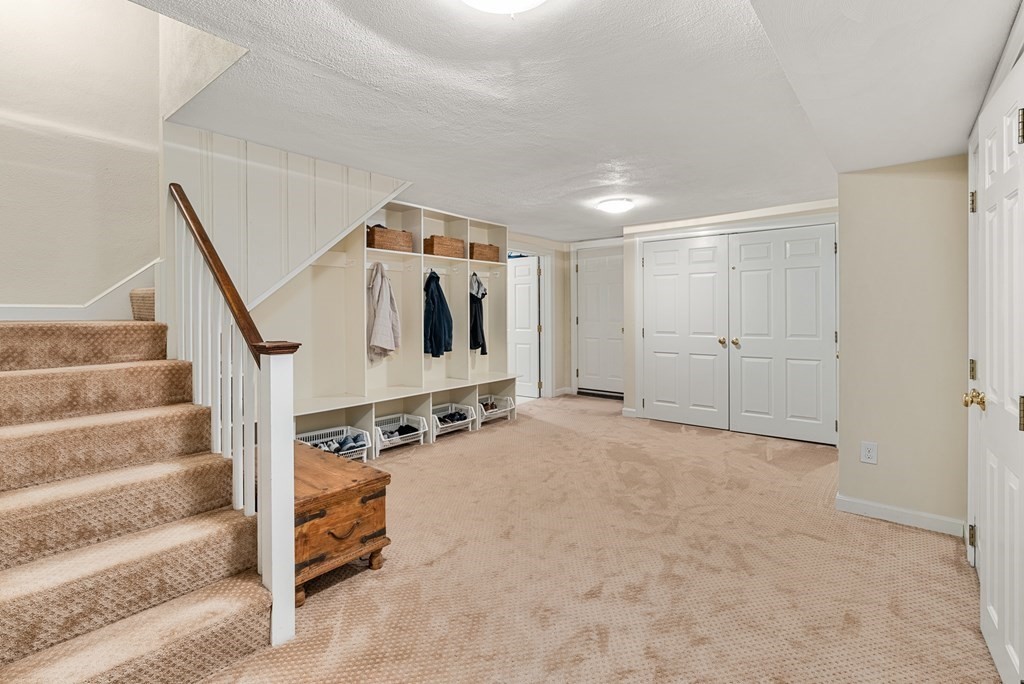 7 Nantucket Road Wellesley, MA 02481 - Photo 31 of 37 a view of an empty room with stairs