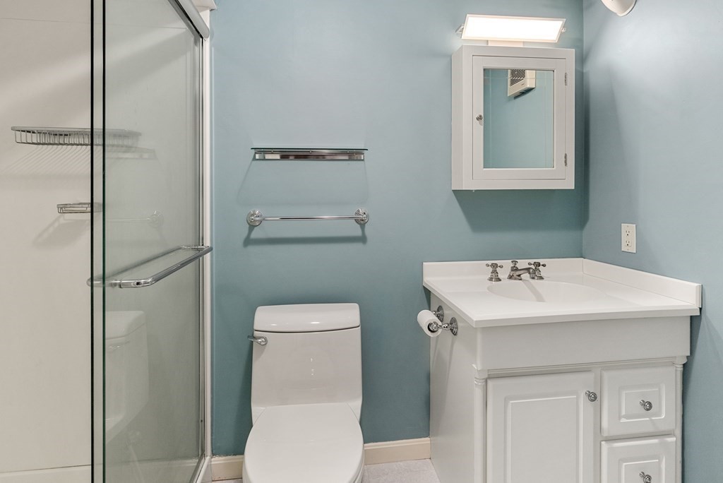 7 Nantucket Road Wellesley, MA 02481 - Photo 33 of 37 a bathroom with a sink a toilet and shower