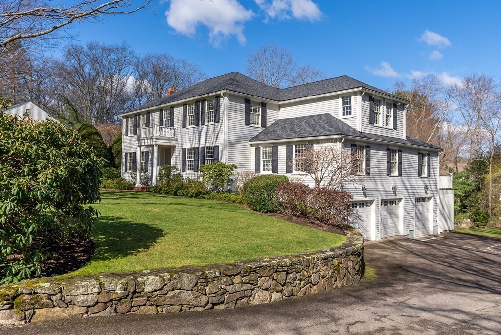 7 Nantucket Road Wellesley, MA 02481 - Photo 4 of 37 a front view of a house with a yard
