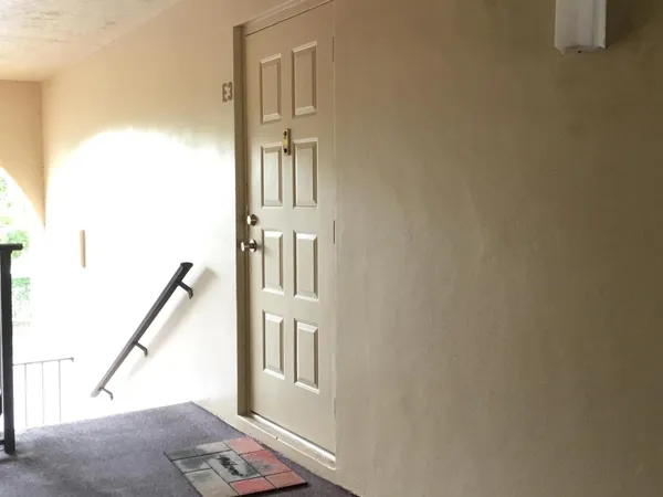 a view of entryway with livingroom