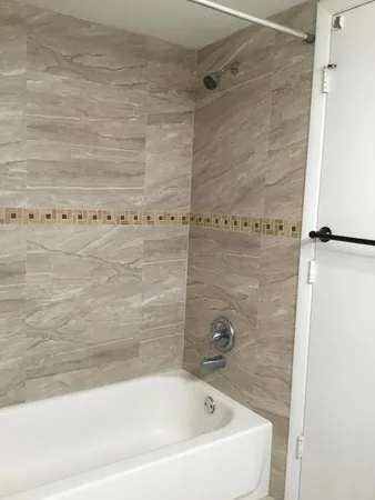 a bathroom with a bathtub