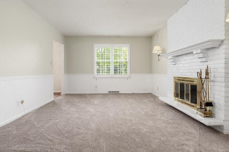 5792 Haddon Place Rockford, IL 61114 - Photo 21 of 47 an empty room with a fireplace