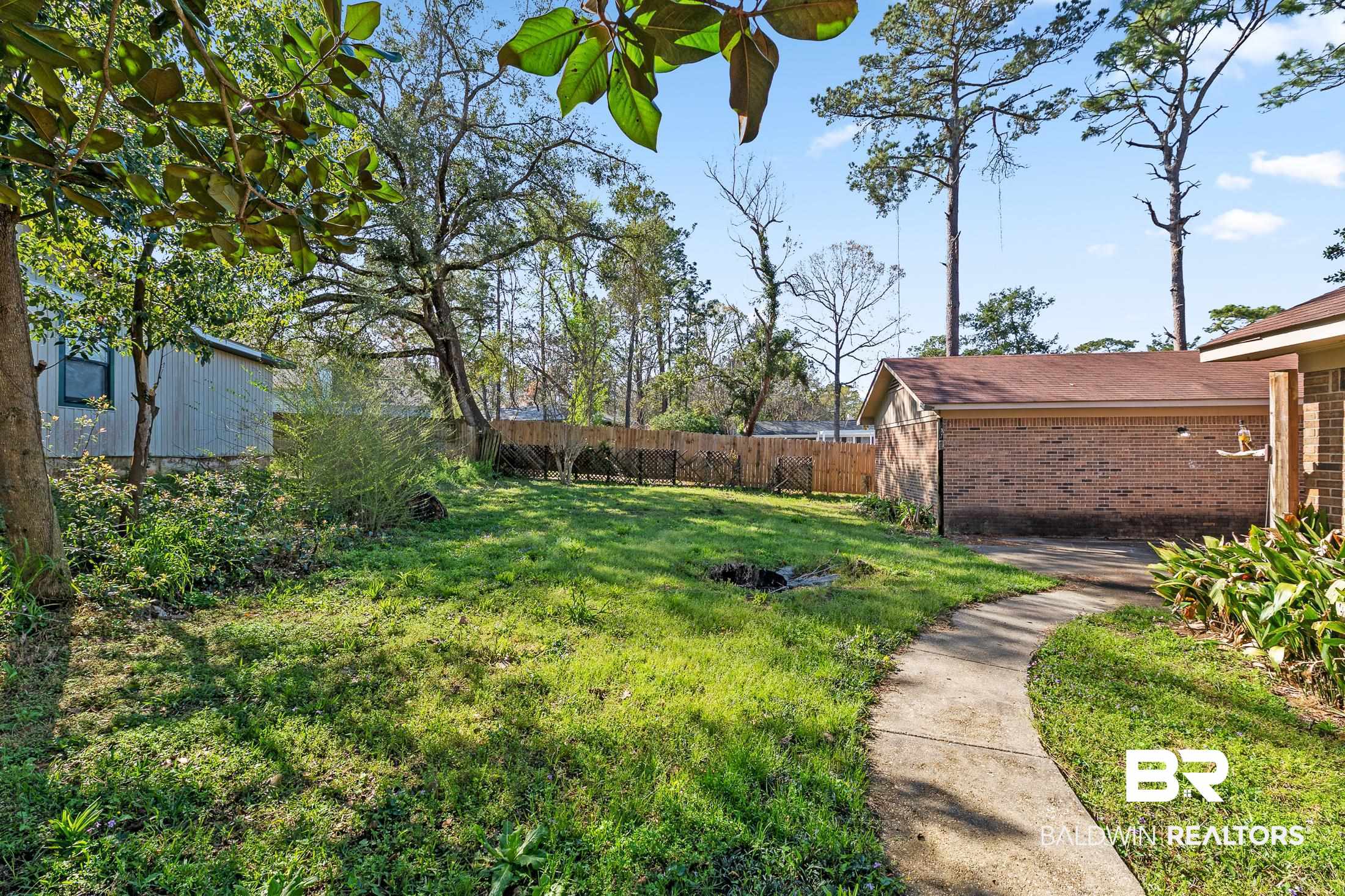 176 Ridgewood Drive Daphne, AL 36526 - Photo 32 of 32 Backyard 3