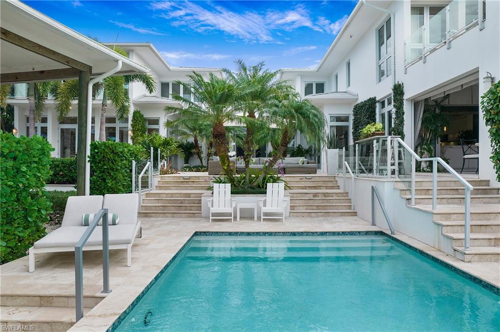 2290 Tarpon Road Naples, FL 34102 - Photo 11 of 50 a view of a house with a yard