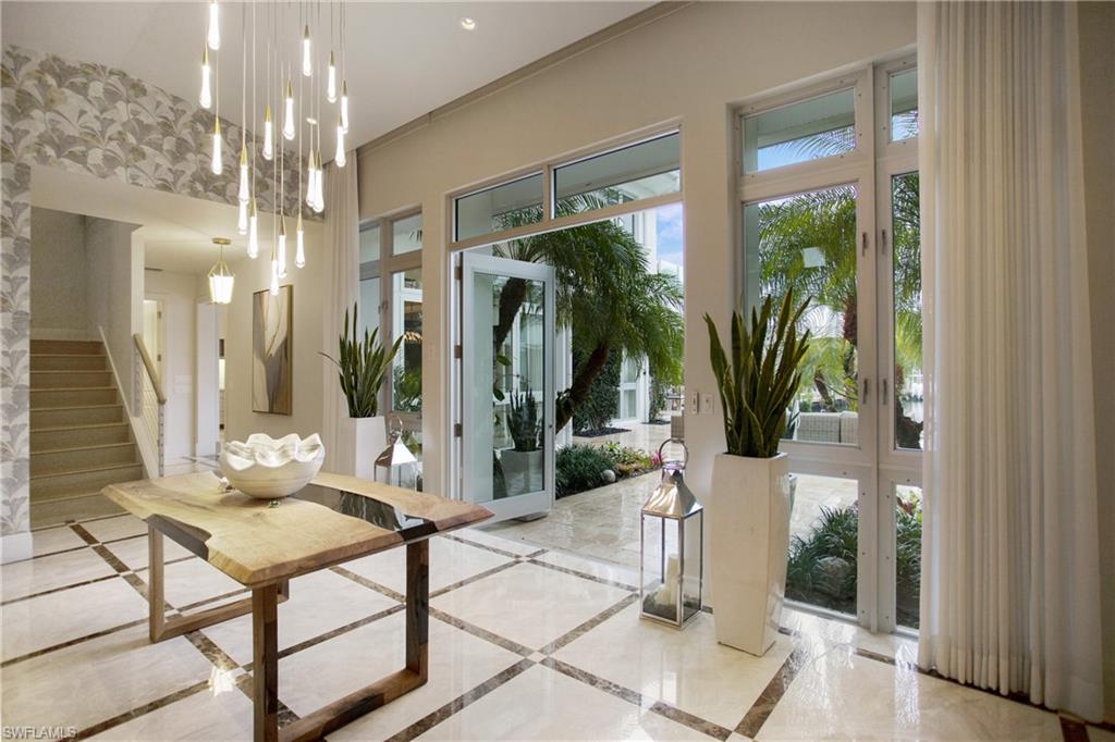 2290 Tarpon Road Naples, FL 34102 - Photo 21 of 50 a very nice looking room with windows