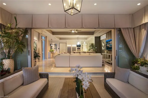 a view of kitchen with furniture and a window