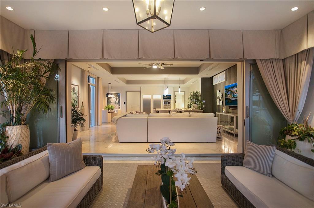 2290 Tarpon Road Naples, FL 34102 - Photo 34 of 50 a view of kitchen with furniture and a window