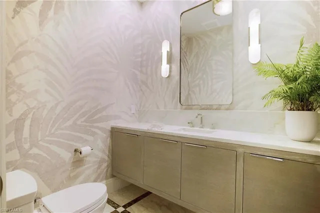 a bathroom with a sink and a toilet