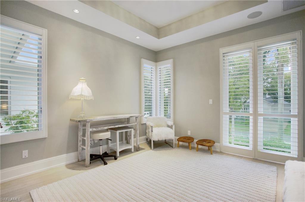2290 Tarpon Road Naples, FL 34102 - Photo 47 of 50 a view of a livingroom with furniture and a large window