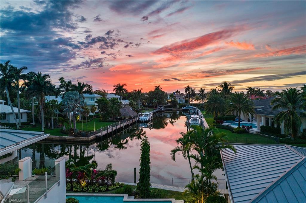 2290 Tarpon Road Naples, FL 34102 - Photo 5 of 50 a view of a lake and outdoor space