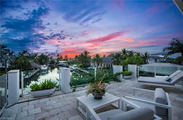 a view of a terrace with sitting area