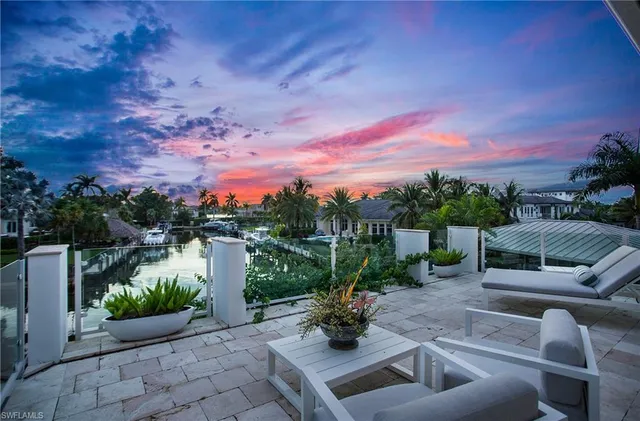 a view of a terrace with sitting area