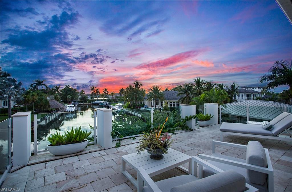 2290 Tarpon Road Naples, FL 34102 - Photo 8 of 50 a view of a terrace with sitting area