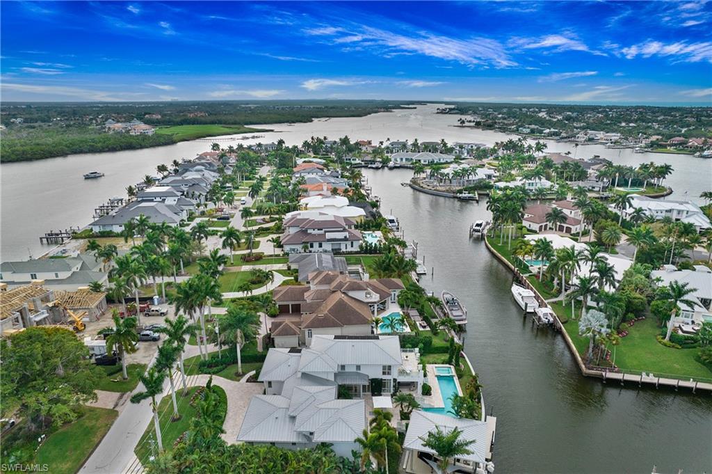 2290 Tarpon Road Naples, FL 34102 - Photo 9 of 50 a view of a lake with a city