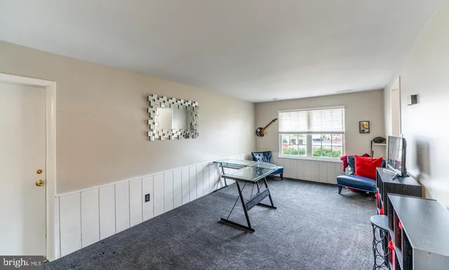 a bathroom with a toilet and a sink