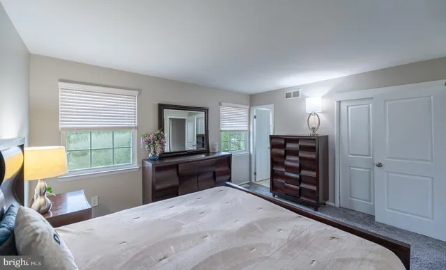 a bathroom with a sink toilet and vanity