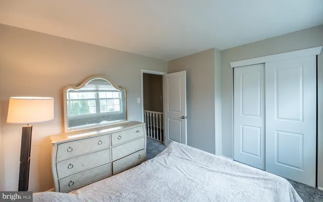 a bathroom with a sink and a window
