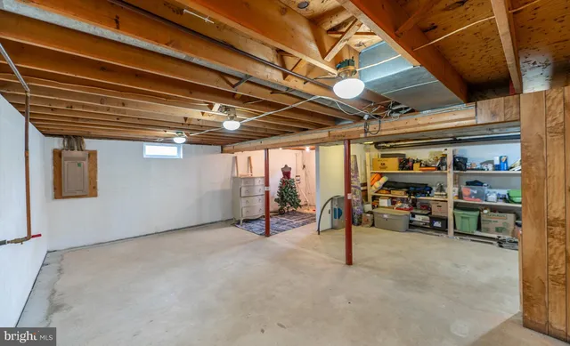 a view of a house with a backyard and sitting area