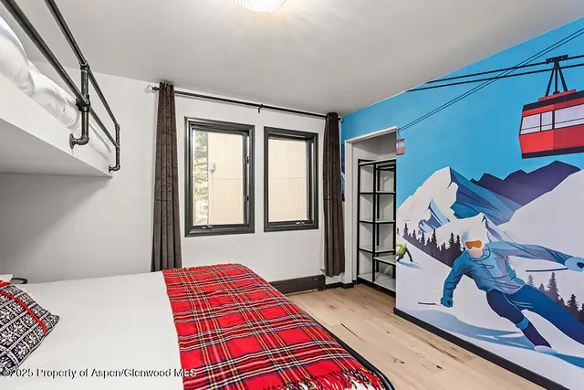 a bathroom with a sink vanity and a mirror
