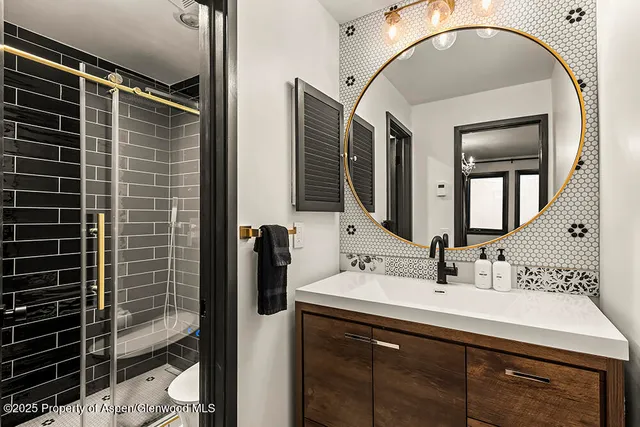a view of living room with furniture and floor to ceiling window