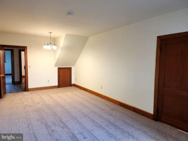 a view of a livingroom with wooden floor