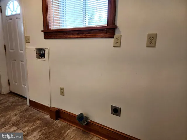 a bathroom with a window and a window