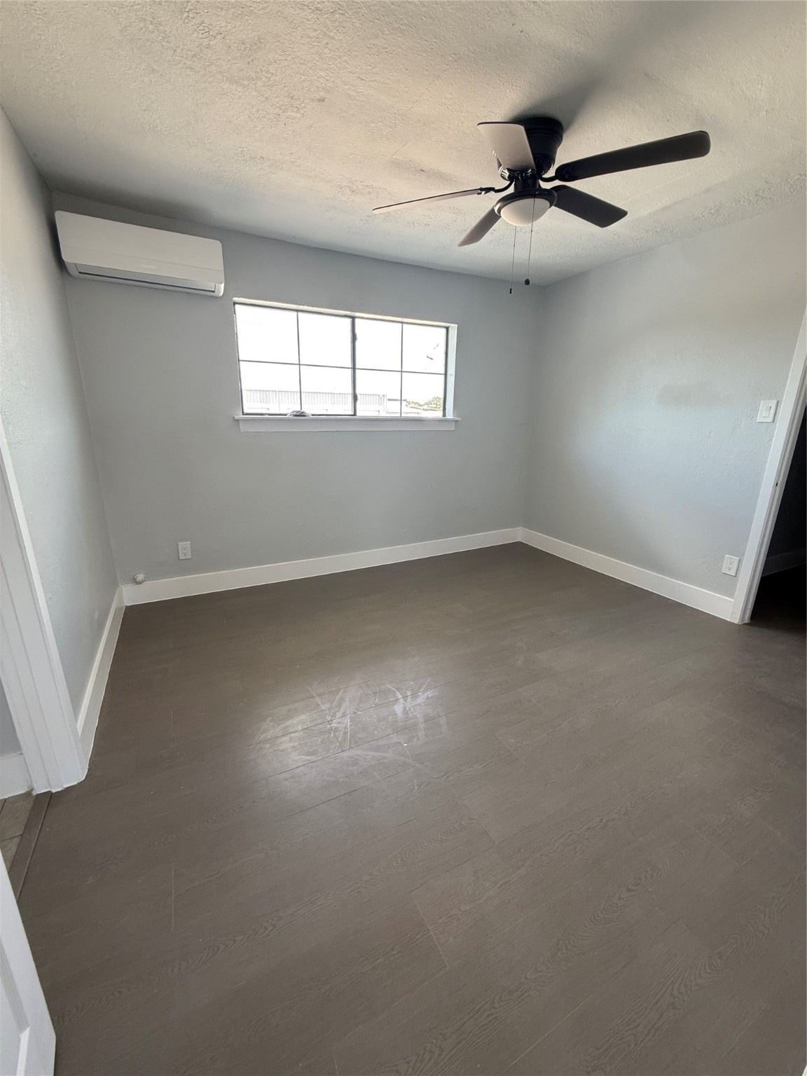 1125 Ann, Unit 7 Pasadena, TX 77506 - Photo 3 of 7 a view of an empty room with a window