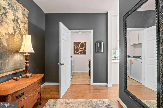 a bathroom with a tub and shower