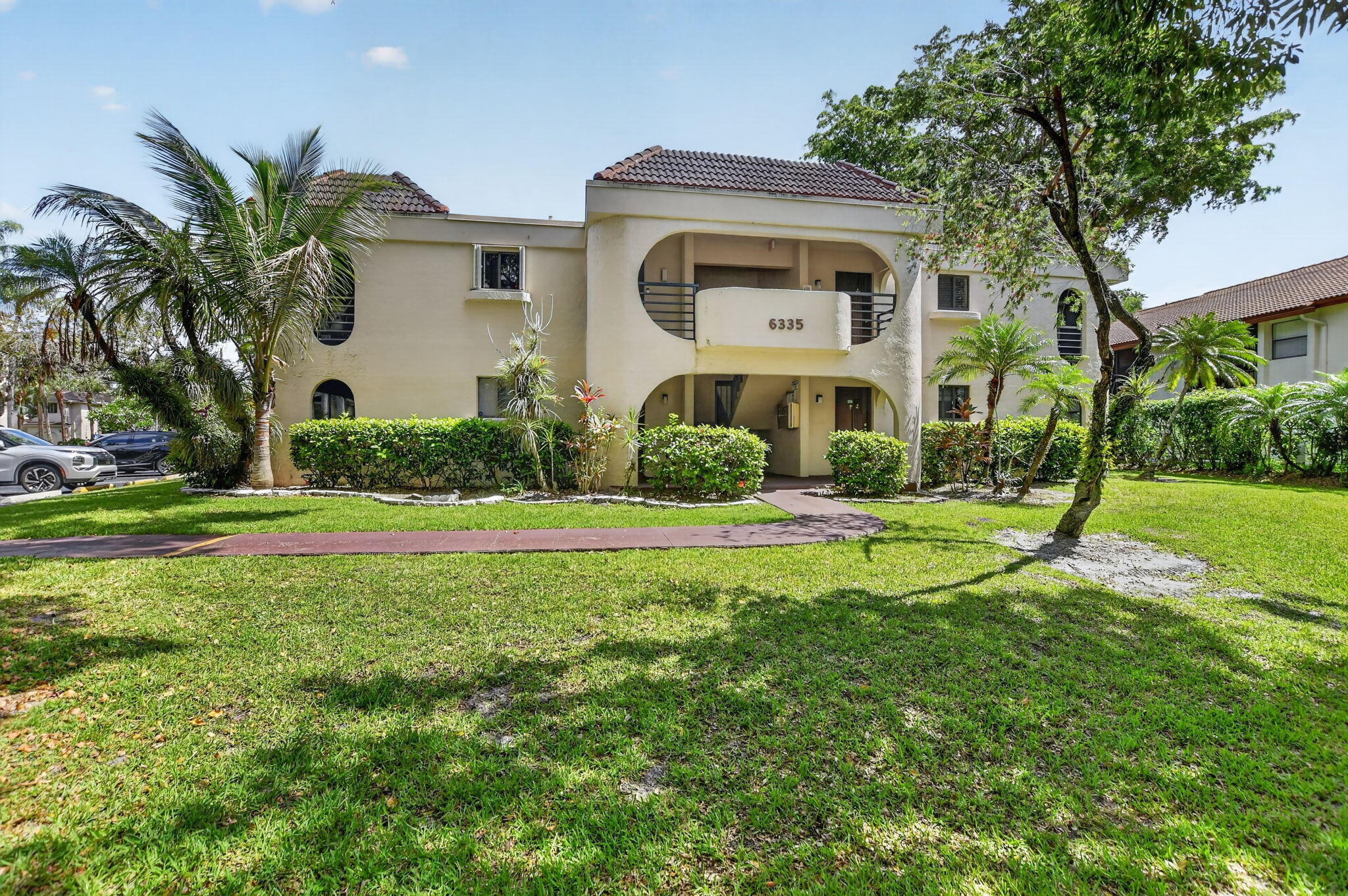 6335 Longboat Lane West, Unit E104 Boca Raton, FL 33433 - Photo 1 of 46 Front View 1