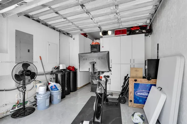 a bathroom with a sink toilet tub and shower