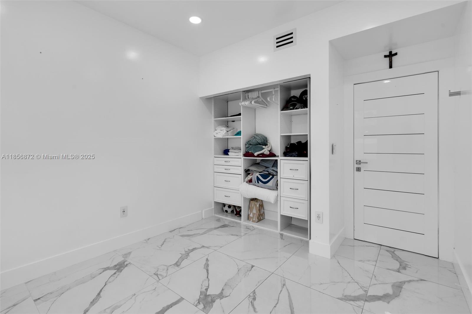 18801 Southwest 25th Court Miramar, FL 33029 - Photo 31 of 41 a view of a bedroom with a furniture and closet