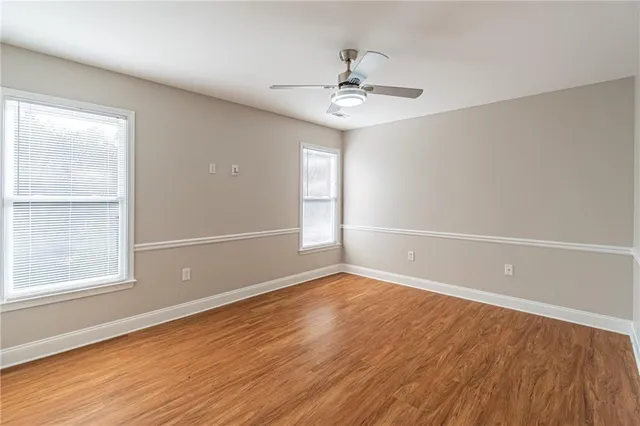 a bathroom with a sink vanity and a mirror