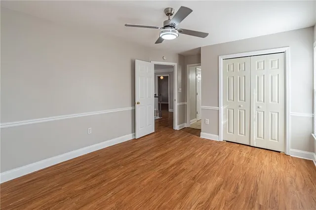 a bathroom with a bathtub and a window