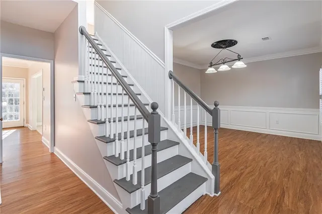 a view of entryway with wooden floor