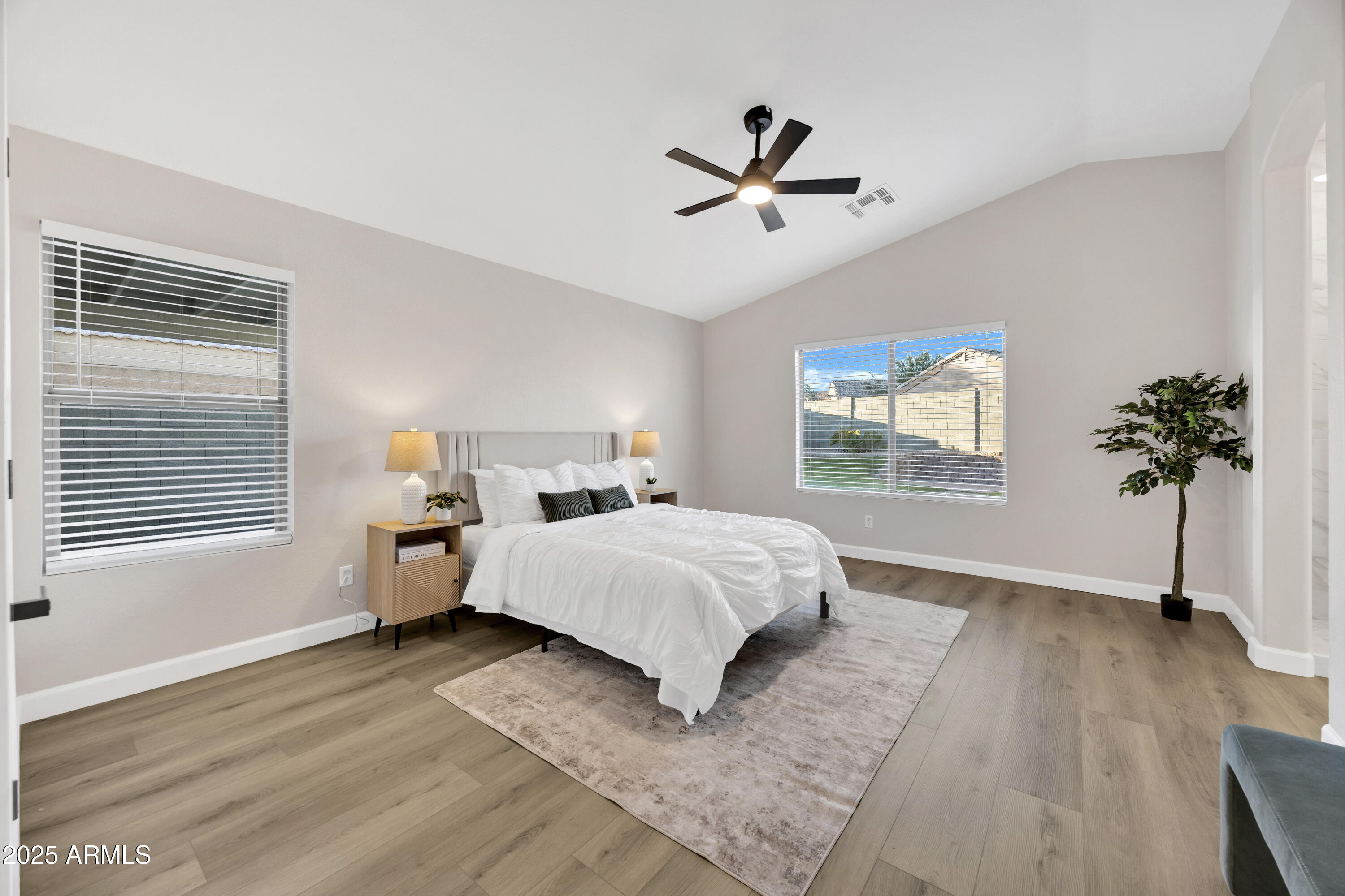 1228 West Diamond Avenue Apache Junction, AZ 85120 - Photo 12 of 25 a bed room with a bed and a window