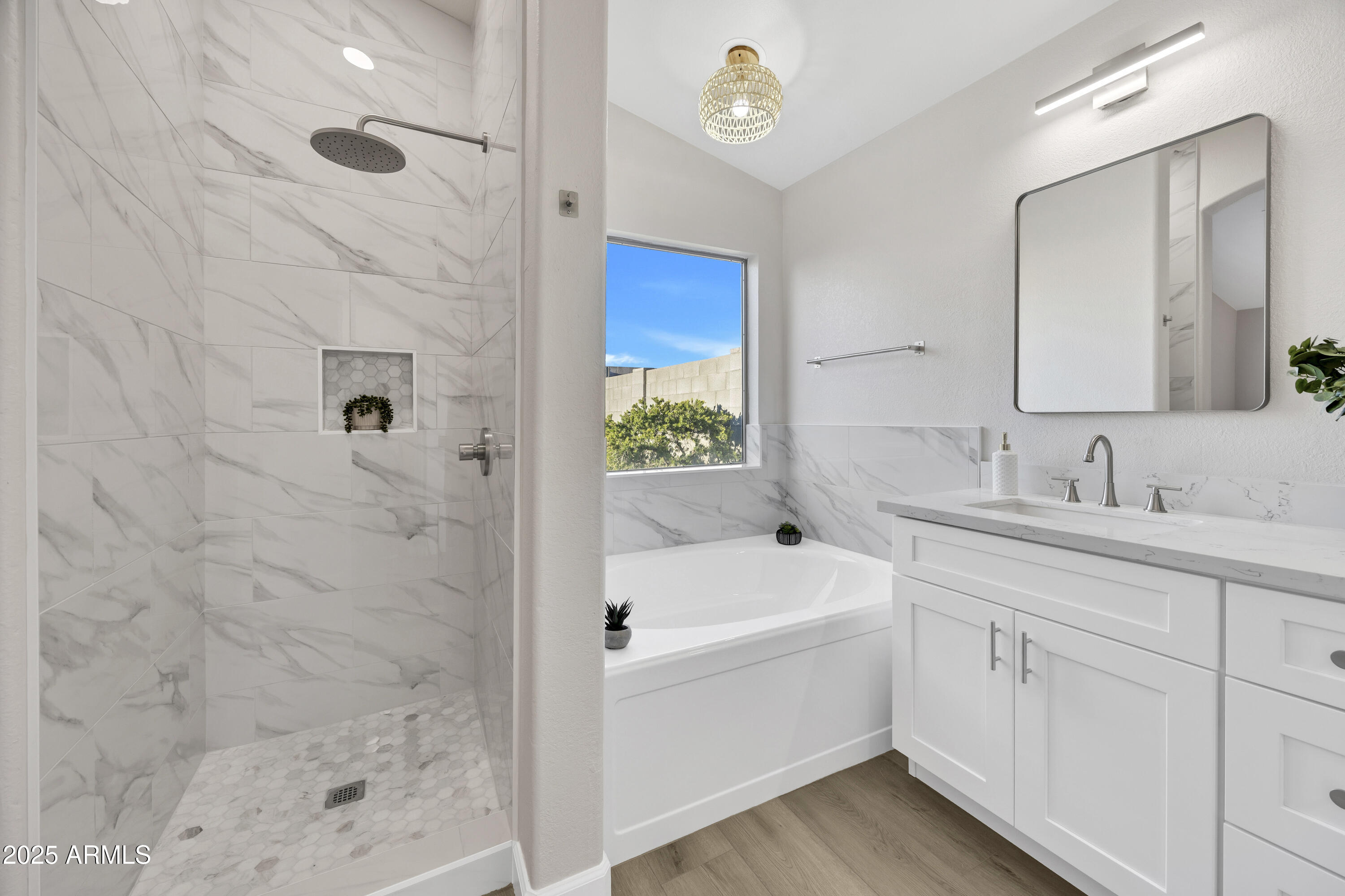1228 West Diamond Avenue Apache Junction, AZ 85120 - Photo 15 of 25 a bathroom with a bathtub a sink and a shower