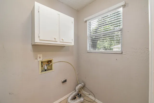 a bathroom with a window and a window