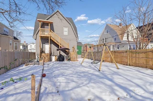 an aerial view of a city with lots of residential buildings
