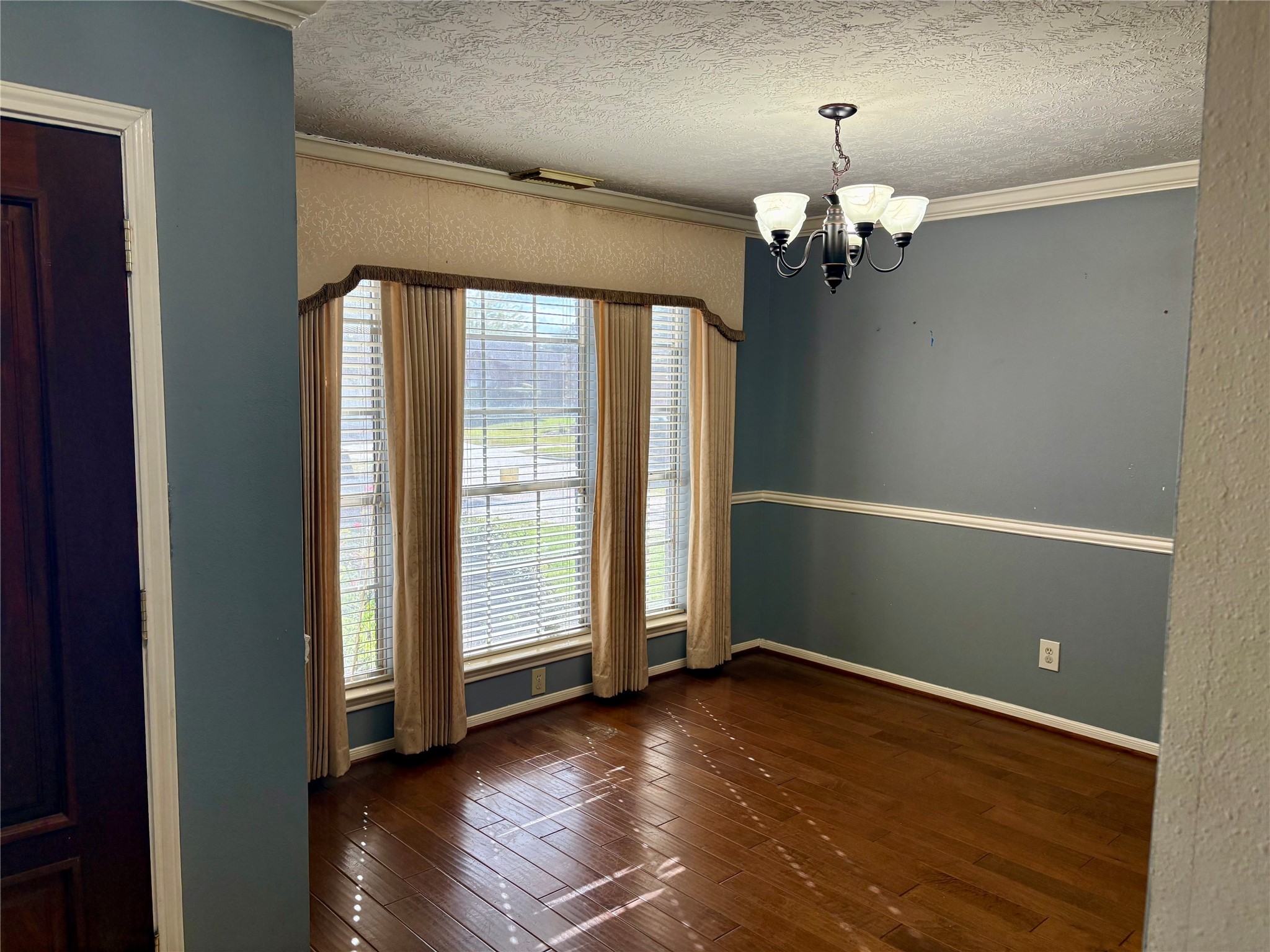 6510 Summit Ridge Court Houston, TX 77085 - Photo 6 of 10 wooden floor in an empty room with a window