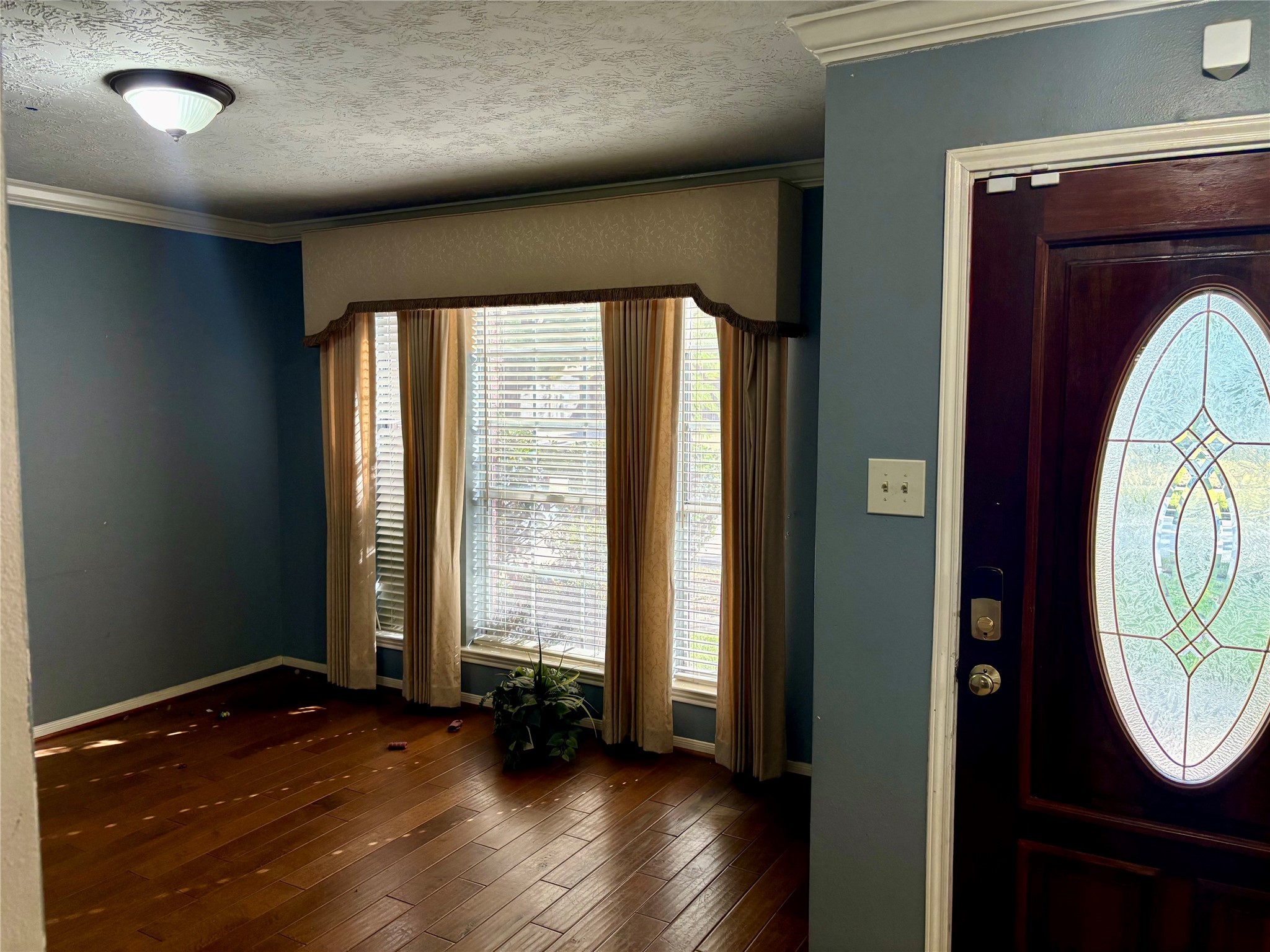 6510 Summit Ridge Court Houston, TX 77085 - Photo 7 of 10 wooden floor in an empty room with a window