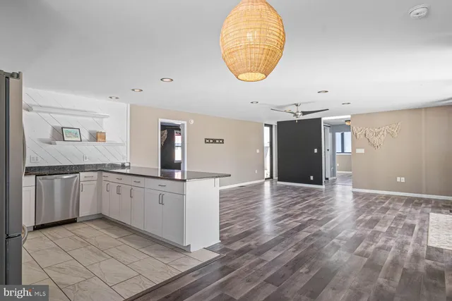 a bathroom with a sink and shower