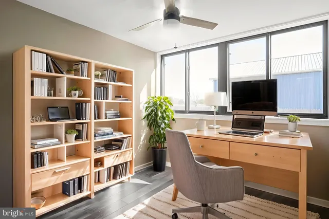 a view of a house with a snow on the road