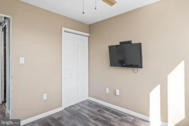 a house with swimming pool in front of it