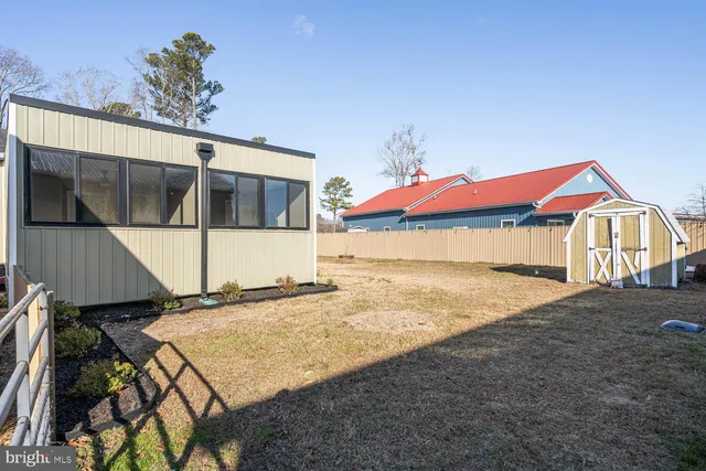 a patio with table and chairs