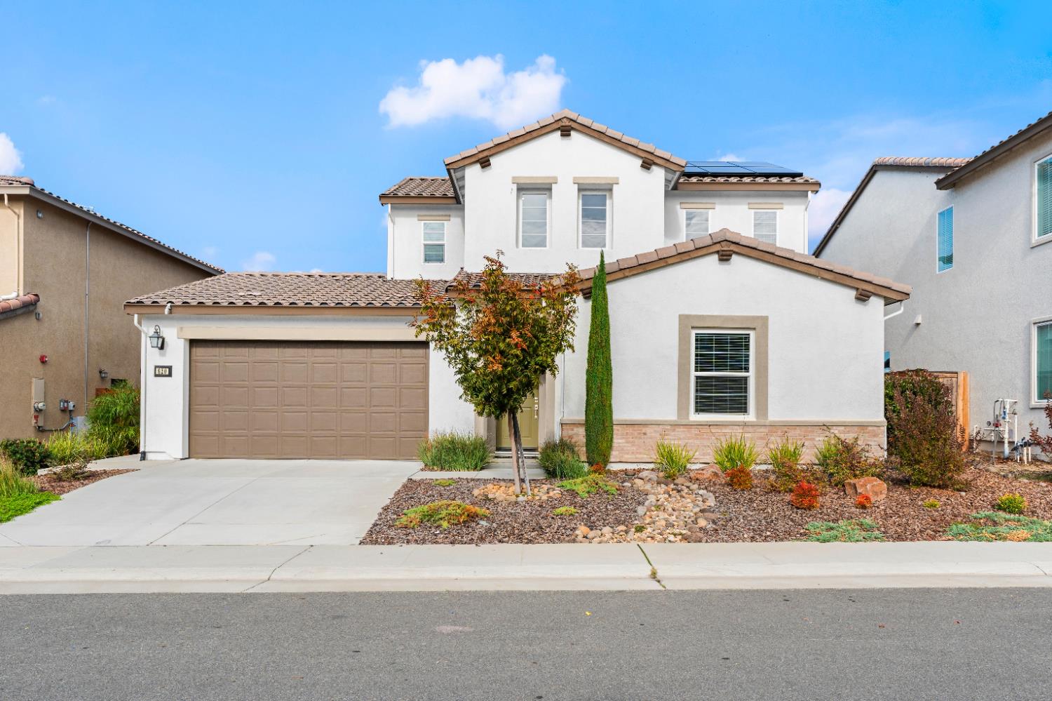 620 River Street Lincoln, CA 95648 - Photo 2 of 60 a front view of a house with a yard and garage