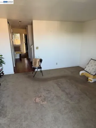 a view of a room with a bench